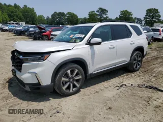 2023 Honda Pilot Touring with VIN 5FNYG1H75PB018012, listed as a Copart auction lot 58642615 with 26,878 mi miles and Salvage title. Bid and sale history available at DreamBid. Image 1.