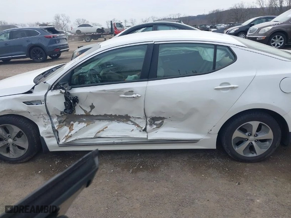 2015 Kia Optima Hybrid with VIN KNAGM4AD7F5086217, listed as a IAAI auction lot 41811147 with NaN miles. Bid and sale history available at carsss.com. Image 14.