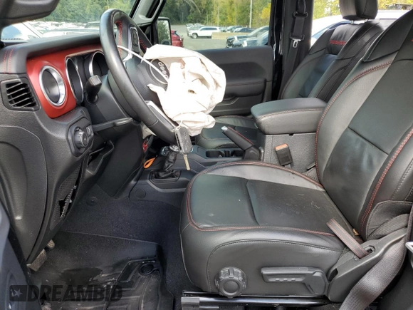 2023 Jeep Wrangler Rubicon with VIN 1C4HJXCGXPW545938, listed as a Copart auction lot 73939634 with 13,590 mi miles and Salvage title. Bid and sale history available at DreamBid. Image 7.