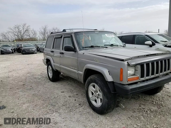 2001 Jeep Cherokee Sport z VIN 1J4FF58SX1L576572, wystawiony jako Copart lot #48982965 z przebiegiem 174 500 mil mil oraz Szkoda całkowita • Salvage title. Historia ofert i sprzedaży dostępna na DreamBid. Obrazek 12.