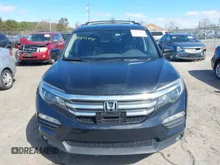 2016 Honda Pilot EX-L with VIN 5FNYF5H57GB023852, listed as a IAAI auction lot 41811412 with 151,707 mi miles and . Bid and sale history available at DreamBid. Image 12.
