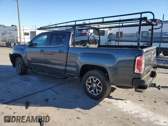 2015 GMC Canyon 2WD SLE with VIN 1GTG5BE38F1240947, listed as a Copart auction lot 82707204 with 63,049 mi miles and Salvage Title. Bid and sale history available at carsss.com. Image 2.