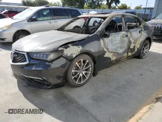 2019 Acura TLX z VIN 19UUB3F34KA001715, wystawiony jako Copart lot #58353614 z przebiegiem Nie podano mil oraz Nie do naprawy. Historia ofert i sprzedaży dostępna na DreamBid. Obrazek 1.