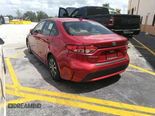2021 Toyota Corolla Hybrid LE with VIN JTDEAMDE5MJ012662, listed as a IAAI auction lot 41421205 with 138,533 mi miles. Bid and sale history available at carsss.com. Image 3.
