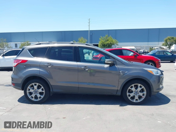 2013 Ford Escape SEL with VIN 1FMCU0HX0DUC16069, listed as a IAAI auction lot 42638924 with 80,200 mi miles and . Bid and sale history available at DreamBid. Image 13.