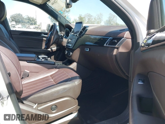 2018 Mercedes-Benz GLS 450 with VIN 4JGDF6EE6JB132415, listed as a IAAI auction lot 42283484 with 54,090 mi miles and . Bid and sale history available at DreamBid. Image 5.