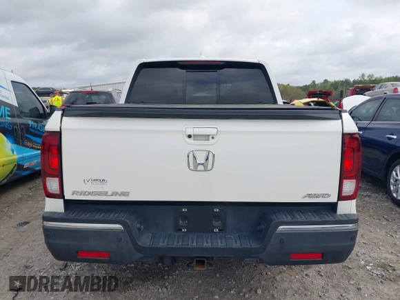 2019 Honda Ridgeline RTL-E with VIN 5FPYK3F78KB018356, listed as a IAAI auction lot 41946363 with 61,472 mi miles and . Bid and sale history available at DreamBid. Image 17.