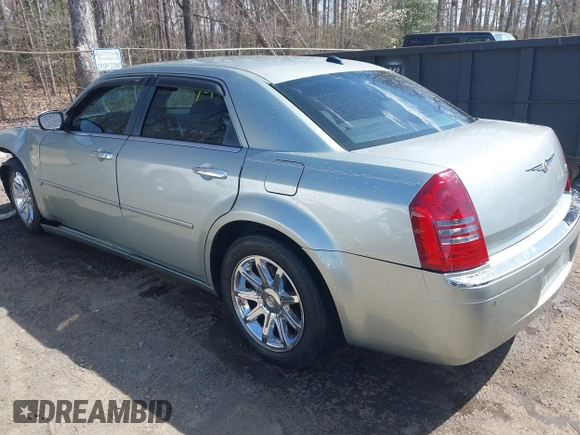 2006 Chrysler 300 C with VIN 2C3LA63H06H105774, listed as a IAAI auction lot 41918634 with 319,232 mi miles. Bid and sale history available at carsss.com. Image 3.