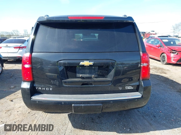 2016 Chevrolet Tahoe LTZ with VIN 1GNSCCKC2GR126687, listed as a IAAI auction lot 41952725 with 202,016 mi miles and . Bid and sale history available at DreamBid. Image 16.