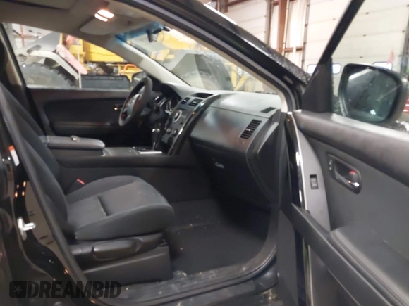 2011 Mazda CX-9 Sport with VIN JM3TB3BV9B0313270, listed as a IAAI auction lot 41474571 with 149,302 mi miles and . Bid and sale history available at DreamBid. Image 5.