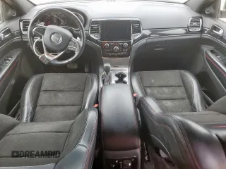 2019 Jeep Grand Cherokee Trailhawk with VIN 1C4RJFLG8KC613582, listed as a Copart auction lot 62901405 with 136,809 mi miles and Salvage title. Bid and sale history available at DreamBid. Image 8.