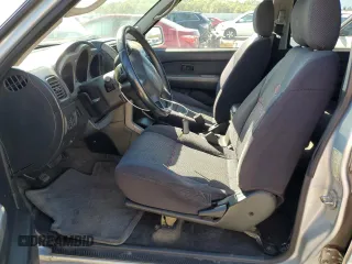 2002 Nissan Frontier z VIN 1N6MD29X62C380509, wystawiony jako Copart lot #50418365 z przebiegiem 223 541 mil mil oraz Czysty tytuł • Clean title. Historia ofert i sprzedaży dostępna na DreamBid. Obrazek 7.