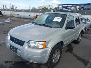 2004 Ford Escape Limited z VIN 1FMCU04104KA41934, wystawiony jako IAAI lot #41444706 z przebiegiem 169 347 mil mil oraz . Historia ofert i sprzedaży dostępna na DreamBid. Obrazek 2.