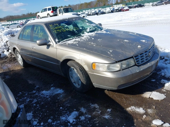 2001 Cadillac Seville Luxury SLS w/Monochrome Pkg with VIN 1G6KS54YX1U103892, listed as a IAAI auction lot 41550499 with 999,999 mi miles. Bid and sale history available at carsss.com. Image 1.
