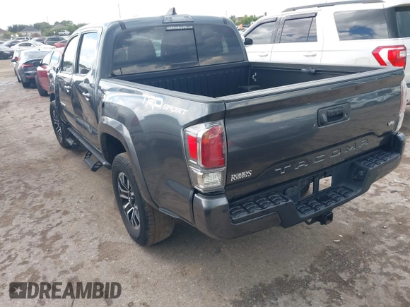 2022 Toyota Tacoma SR5 with VIN 3TMAZ5CN6NM186713, listed as a IAAI auction lot 42607719 with 60,704 mi miles and . Bid and sale history available at DreamBid. Image 3.