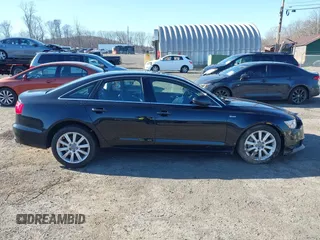2014 Audi A6 Premium Plus z VIN WAUFGAFC5EN133941, wystawiony jako IAAI lot #41835479 z przebiegiem 68 911 mil mil oraz . Historia ofert i sprzedaży dostępna na DreamBid. Obrazek 13.