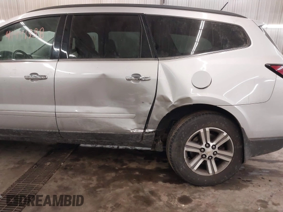 2015 Chevrolet Traverse LT with VIN 1GNKVHKD4FJ305990, listed as a IAAI auction lot 41441938 with 203,877 mi miles and . Bid and sale history available at DreamBid. Image 6.