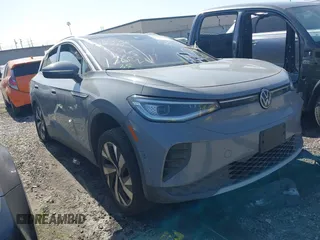 2022 Volkswagen ID.4 Pro S z VIN WVGUNPE27NP055223, wystawiony jako IAAI lot #41203172 z przebiegiem 88 058 mil mil oraz . Historia ofert i sprzedaży dostępna na DreamBid. Obrazek 1.