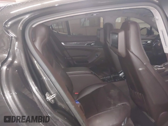2014 Porsche Panamera GTS with VIN WP0AF2A73EL083133, listed as a IAAI auction lot 41945656 with 75,701 mi miles and . Bid and sale history available at DreamBid. Image 8.