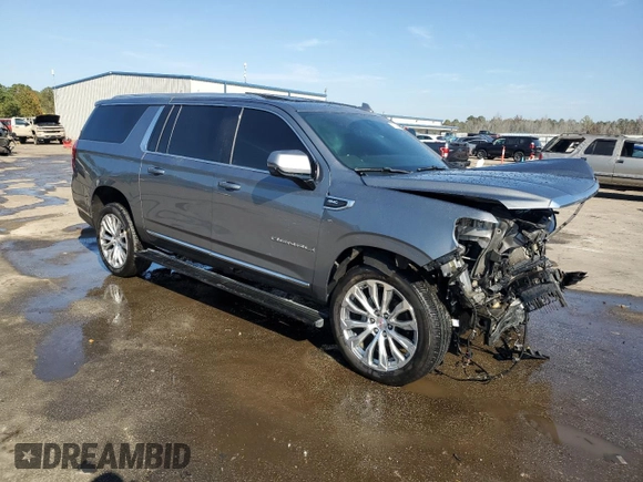 2022 GMC Yukon XL Denali with VIN 1GKS2JKLXNR228983, listed as a Copart auction lot 79202834 with 87,467 mi miles and Salvage Title. Bid and sale history available at carsss.com. Image 4.