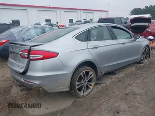 2020 Ford Fusion Titanium with VIN 3FA6P0D99LR138127, listed as a IAAI auction lot 42439024 with 128,792 mi miles and . Bid and sale history available at DreamBid. Image 4.