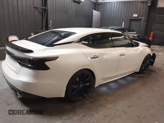 2016 Nissan Maxima SL with VIN 1N4AA6AP2GC439621, listed as a IAAI auction lot 41745052 with 23,484 mi miles and . Bid and sale history available at DreamBid. Image 4.