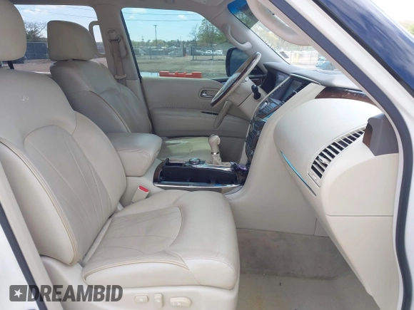 2013 Infiniti QX56 z VIN JN8AZ2NE1D9042676, wystawiony jako IAAI lot #42181659 z przebiegiem 113 454 mil mil oraz . Historia ofert i sprzedaży dostępna na DreamBid. Obrazek 5.