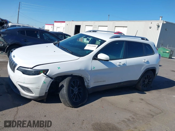2020 Jeep Cherokee Latitude with VIN 1C4PJMCB0LD502665, listed as a IAAI auction lot 42165000 with 65,159 mi miles and . Bid and sale history available at DreamBid. Image 14.