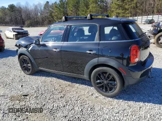 2015 MINI Countryman with VIN WMWZB3C50FWM33153, listed as a Copart auction lot 88238955 with 88,744 mi miles and Salvage Title. Bid and sale history available at DreamBid. Image 2.