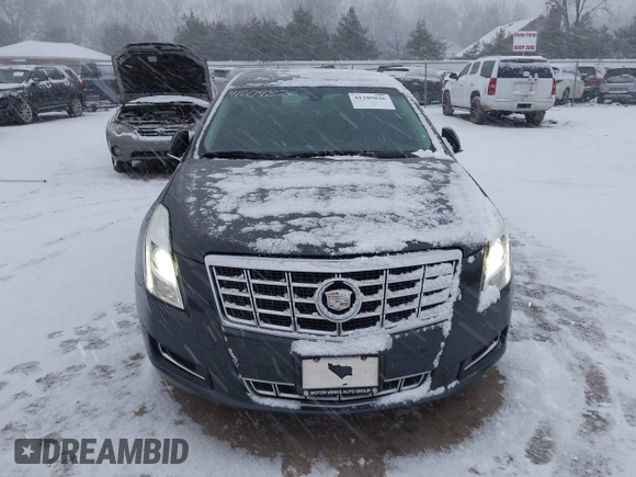 2013 Cadillac XTS with VIN 2G61N5S37D9112979, listed as a IAAI auction lot 41209826 with 83,237 mi miles. Bid and sale history available at carsss.com. Image 12.