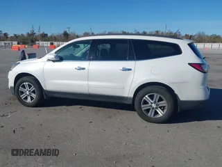 2016 Chevrolet Traverse LT z VIN 1GNKRHKD0GJ271990, wystawiony jako IAAI lot #41286827 z przebiegiem 115 216 mil mil oraz . Historia ofert i sprzedaży dostępna na DreamBid. Obrazek 14.