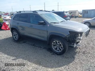 2022 Jeep Cherokee Trailhawk with VIN 1C4PJMBX2ND525770, listed as a IAAI auction lot 42453995 with 18,102 mi miles and . Bid and sale history available at DreamBid. Image 1.