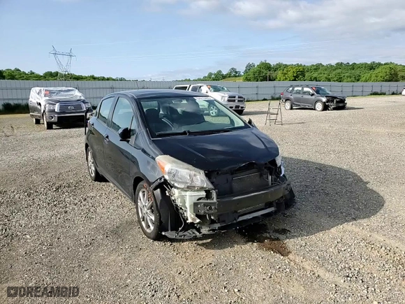 2012 Toyota Yaris L with VIN JTDKTUD32CD505384, listed as a Copart auction lot 52215485 with 136,069 mi miles and Salvage Title. Bid and sale history available at carsss.com. Image 11.