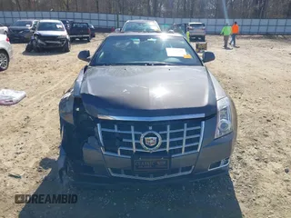 2013 Cadillac CTS Premium with VIN 1G6DP1E36D0142013, listed as a IAAI auction lot 41836129 with 192,804 mi miles and . Bid and sale history available at DreamBid. Image 13.