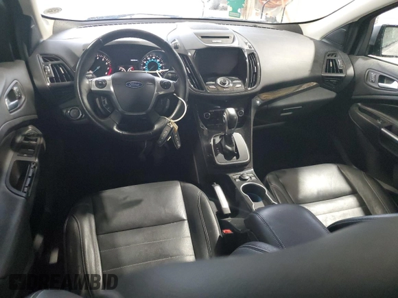 2014 Ford Escape Titanium с VIN 1FMCU0J98EUA35069, выставлен на аукционе Copart как лот 58369635 с пробегом 92 323 миль миль и Списание • Salvage title. История ставок и продаж доступна на DreamBid. Изображение 8.