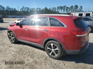 2018 Kia Sorento EX with VIN 5XYPH4A57JG409763, listed as a Copart auction lot 87258384 with 134,296 mi miles and Salvage Title. Bid and sale history available at DreamBid. Image 2.