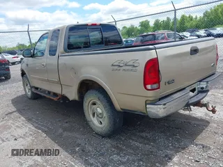 2000 Ford F-150 XL with VIN 1FTRX18L9YNB70363, listed as a IAAI auction lot 42140312 with 226,686 mi miles and . Bid and sale history available at DreamBid. Image 3.