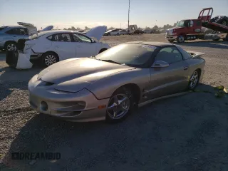 1999 Pontiac Firebird Formula с VIN 2G2FV22G3X2206170, выставлен на аукционе Copart как лот 74780914 с пробегом Не указан миль и Списание • Salvage title. История ставок и продаж доступна на DreamBid. Изображение 1.