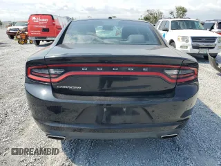 2015 Dodge Charger SE z VIN 2C3CDXBG8FH776308, wystawiony jako Copart lot #56364435 z przebiegiem 145 005 mil mil oraz Szkoda całkowita • Salvage title. Historia ofert i sprzedaży dostępna na DreamBid. Obrazek 6.