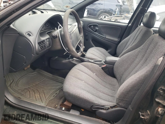 2000 Chevrolet Cavalier z VIN 1G1JC5242Y7365977, wystawiony jako Copart lot #81524304 z przebiegiem Nie podano mil oraz Czysty tytuł • Clean title. Historia ofert i sprzedaży dostępna na DreamBid. Obrazek 7.