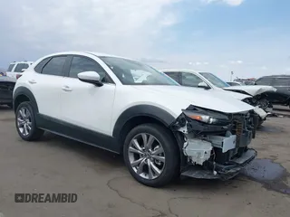2021 Mazda CX-30 Select with VIN 3MVDMBBL8MM210971, listed as a IAAI auction lot 42759728 with 19,953 mi miles and . Bid and sale history available at DreamBid. Image 1.