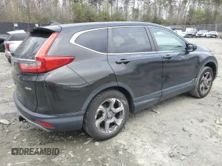 2018 Honda CR-V EX with VIN 2HKRW2H57JH694949, listed as a Copart auction lot 51324315 with 94,470 mi miles and Salvage Title. Bid and sale history available at DreamBid. Image 3.
