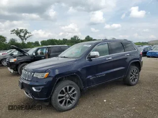 2017 Jeep Grand Cherokee Overland with VIN 1C4RJFCG4HC694654, listed as a Copart auction lot 60788645 with 155,642 mi miles and Salvage title. Bid and sale history available at DreamBid. Image 1.