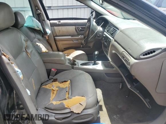 2002 Mercury Sable LS Premium with VIN 1MEHM55S02A621328, listed as a Copart auction lot 59556805 with 183,594 mi miles and Salvage title. Bid and sale history available at DreamBid. Image 7.
