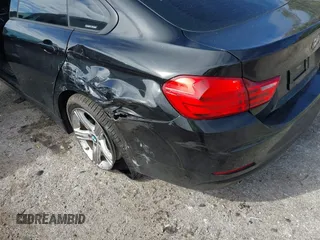 2015 BMW 4 Series 428i z VIN WBA4A9C58FGL85170, wystawiony jako IAAI lot #41362595 z przebiegiem 172 509 mil mil oraz . Historia ofert i sprzedaży dostępna na DreamBid. Obrazek 6.