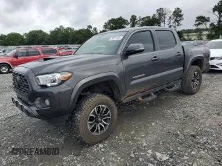 2020 Toyota Tacoma SR5 z VIN 3TMCZ5AN5LM292370, wystawiony jako Copart lot #59757855 z przebiegiem 141 897 mil mil oraz Szkoda całkowita • Salvage title. Historia ofert i sprzedaży dostępna na DreamBid. Obrazek 1.