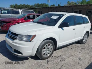2015 Dodge Journey American Value Pkg with VIN 3C4PDCAB5FT537950, listed as a IAAI auction lot 42042471 with 198,881 mi miles. Bid and sale history available at carsss.com. Image 2.