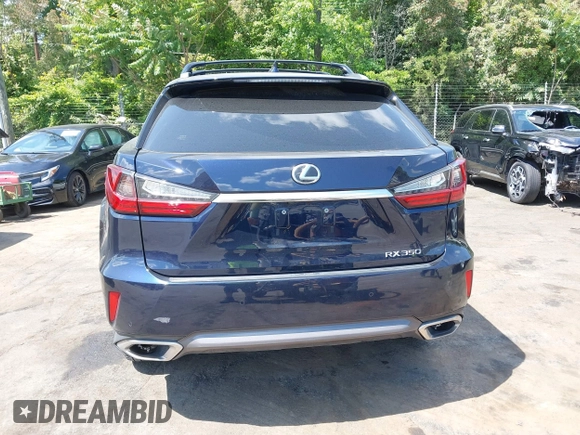 2016 Lexus RX 350 with VIN JTJBZMCA2G2001429, listed as a IAAI auction lot 42202436 with Not provided miles and . Bid and sale history available at DreamBid. Image 16.