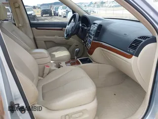 2007 Hyundai Santa Fe SE z VIN 5NMSH73E87H051418, wystawiony jako IAAI lot #41606640 z przebiegiem 185 407 mil mil oraz . Historia ofert i sprzedaży dostępna na DreamBid. Obrazek 5.
