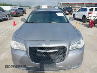 2016 Chrysler 300 Anniversary Edition with VIN 2C3CCAAG9GH211875, listed as a IAAI auction lot 42052083 with 209,251 mi miles and . Bid and sale history available at DreamBid. Image 12.